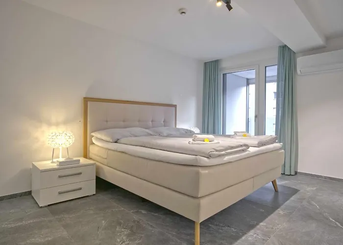 Jungfraucenter Baellenhoechst - Griwa Rent Ag * Entrelagos